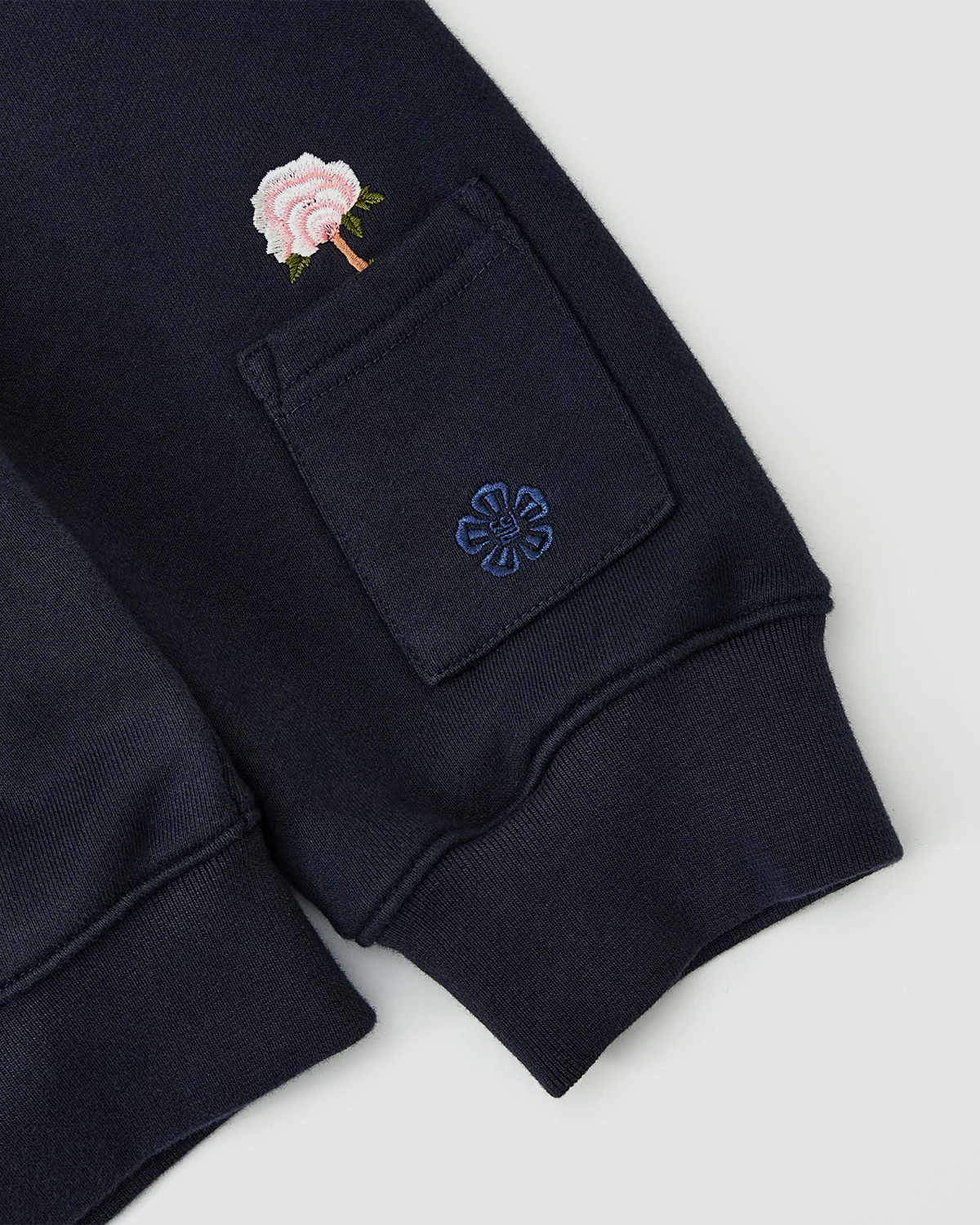 NAVY FLOWER KNOT ZIP UP - Image 7
